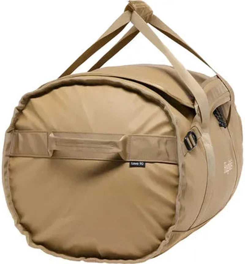 Bakvy av beige Lava 90 väska med bottenfack och etikettmärke